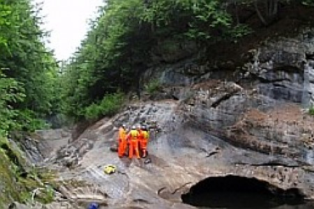 Trout brook reemerges from Garnet Cave to Artist's Gorge